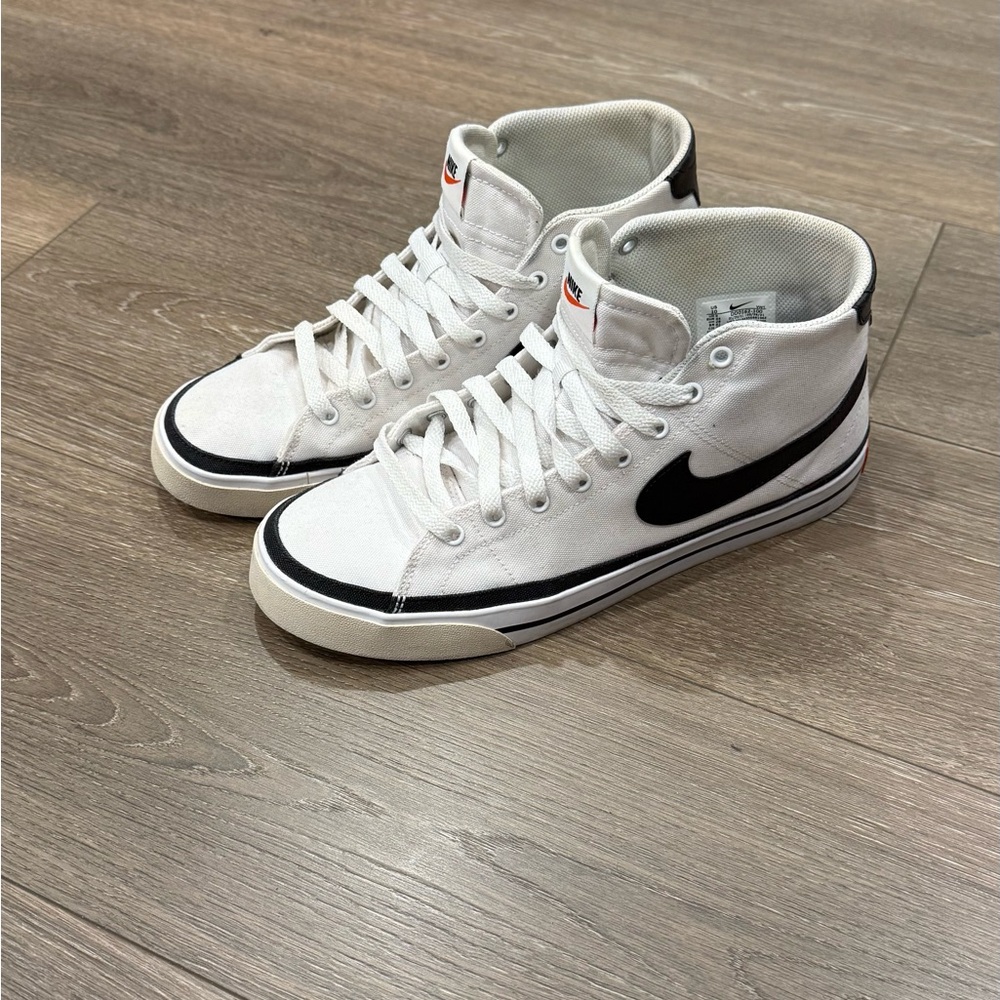 Nike White High-Top Sneakers with Black Swoosh